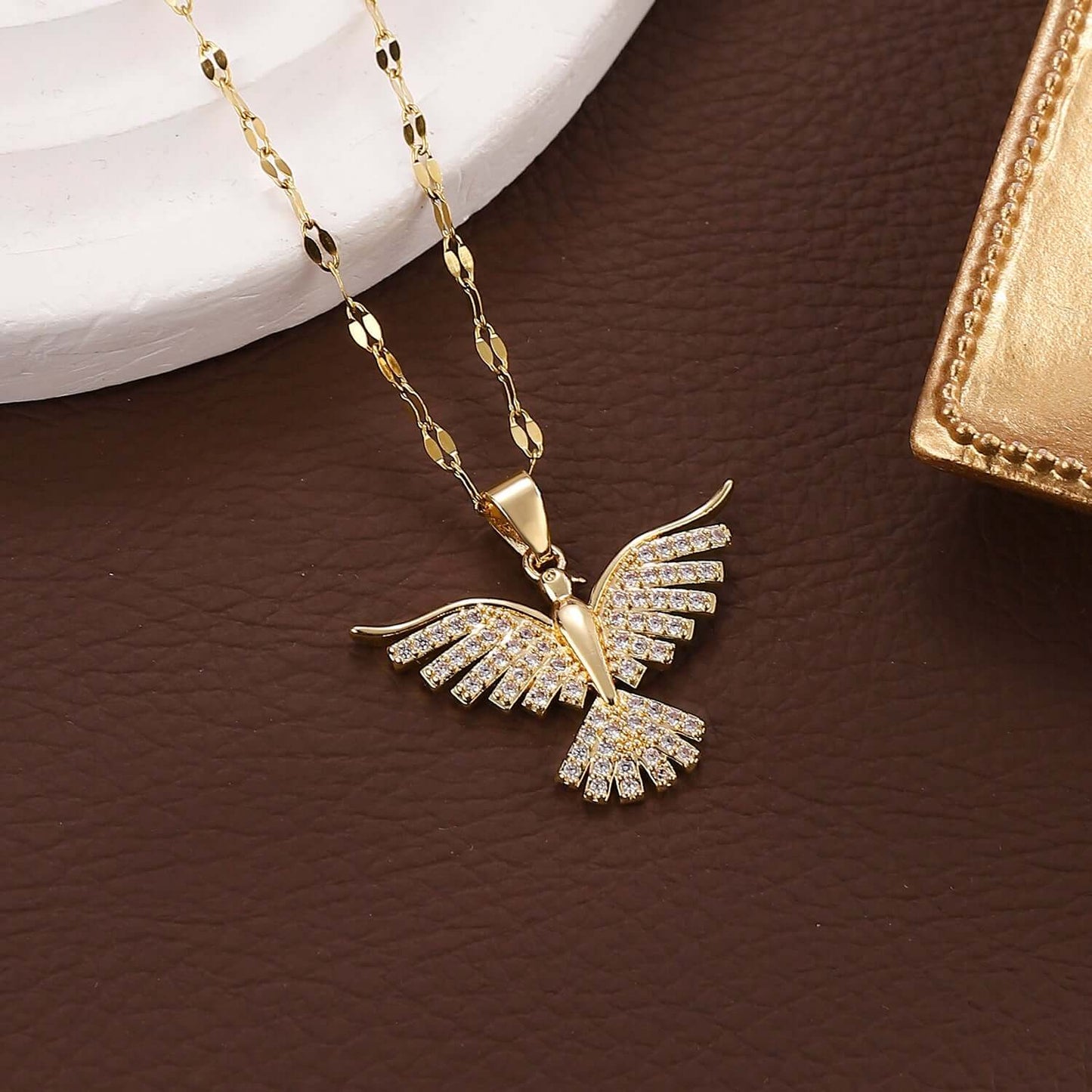 Gold Phoenix necklace with crystal-encrusted wings – Links & Loops Jewellery