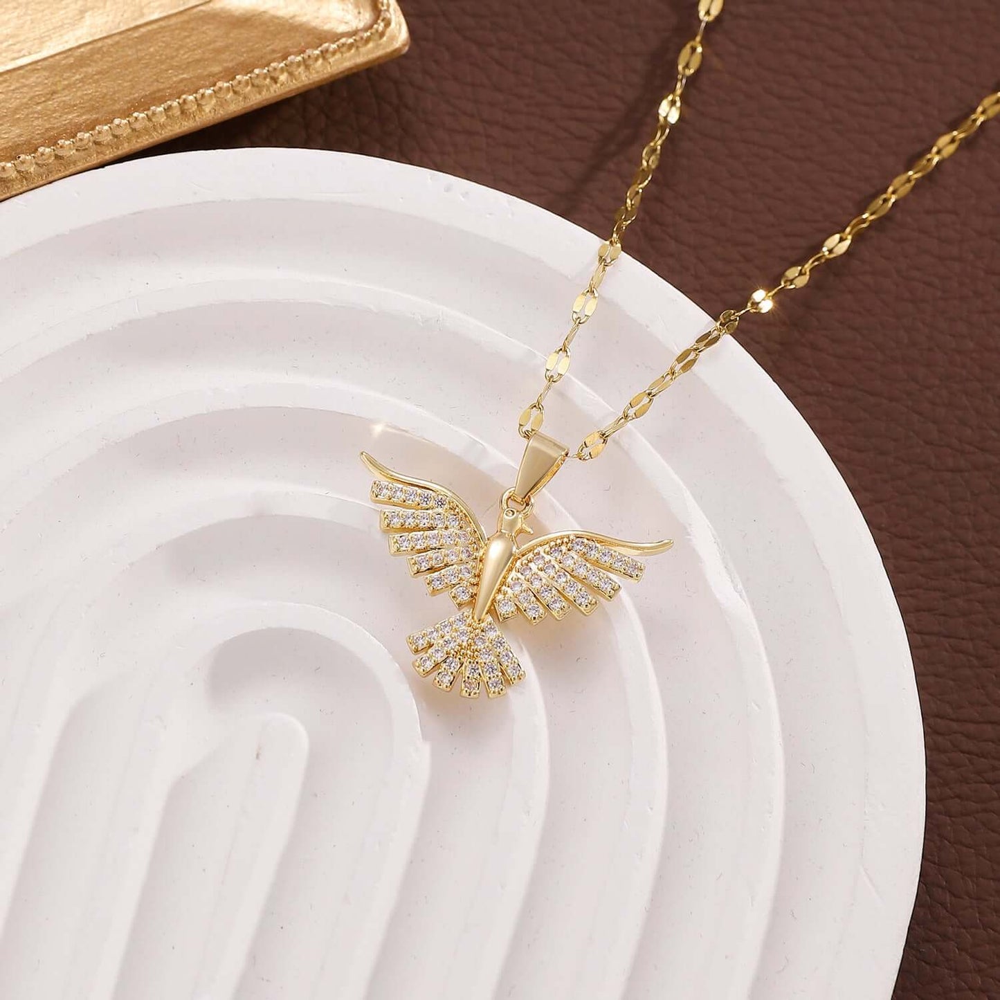 Phoenix Gold Necklace with detailed wing design – Links & Loops Jewellery