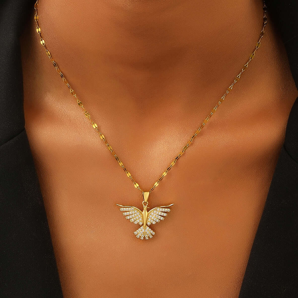Gold Phoenix pendant necklace on model – Links & Loops Jewellery