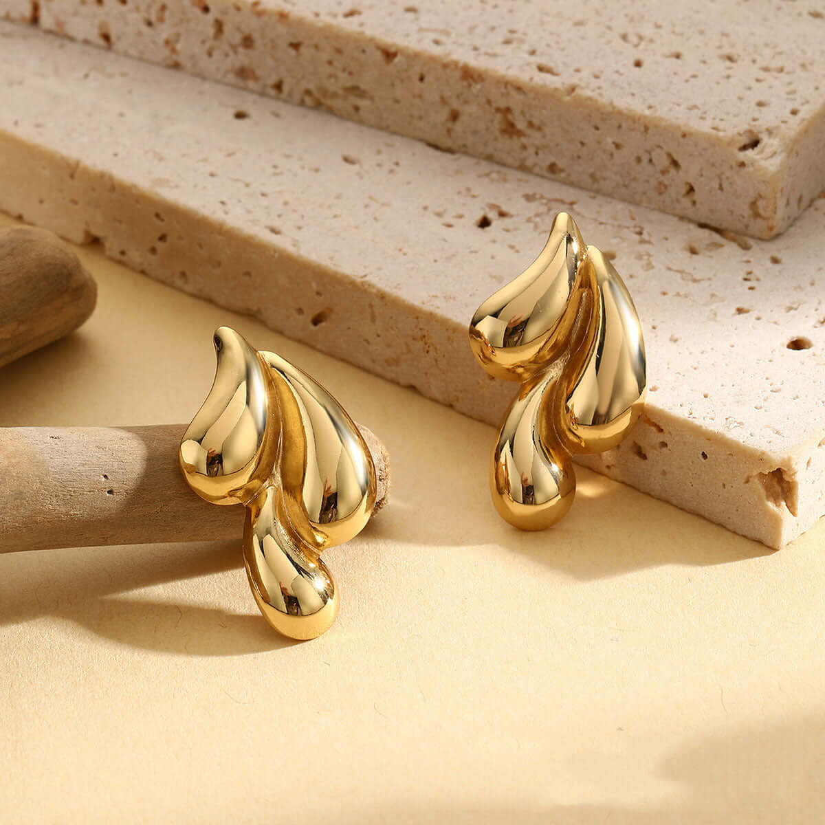 Gold abstract drop earrings with fluid molten design – Links & Loops Jewellery